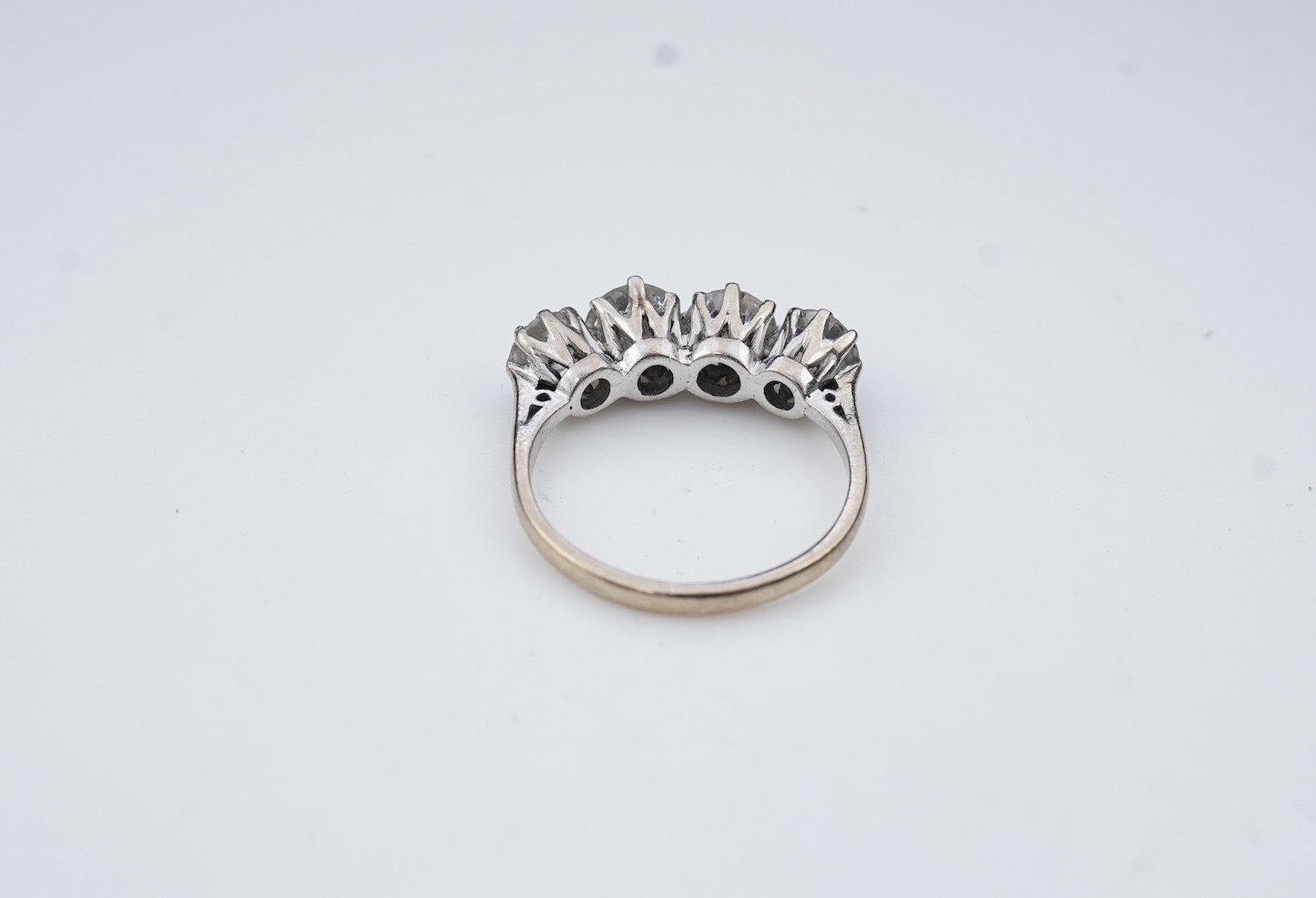 A four-stone diamond ring